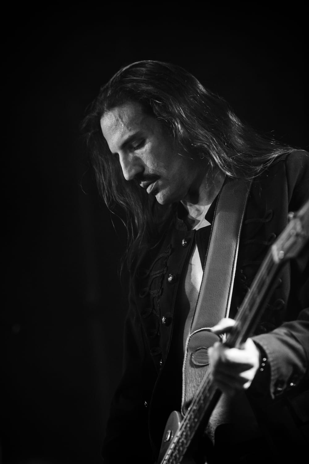 David Zenz playing bass on stage