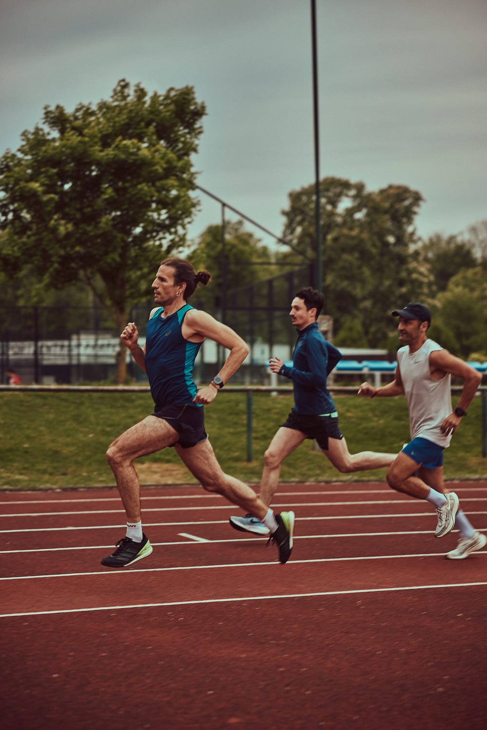 David Zenz running on a track